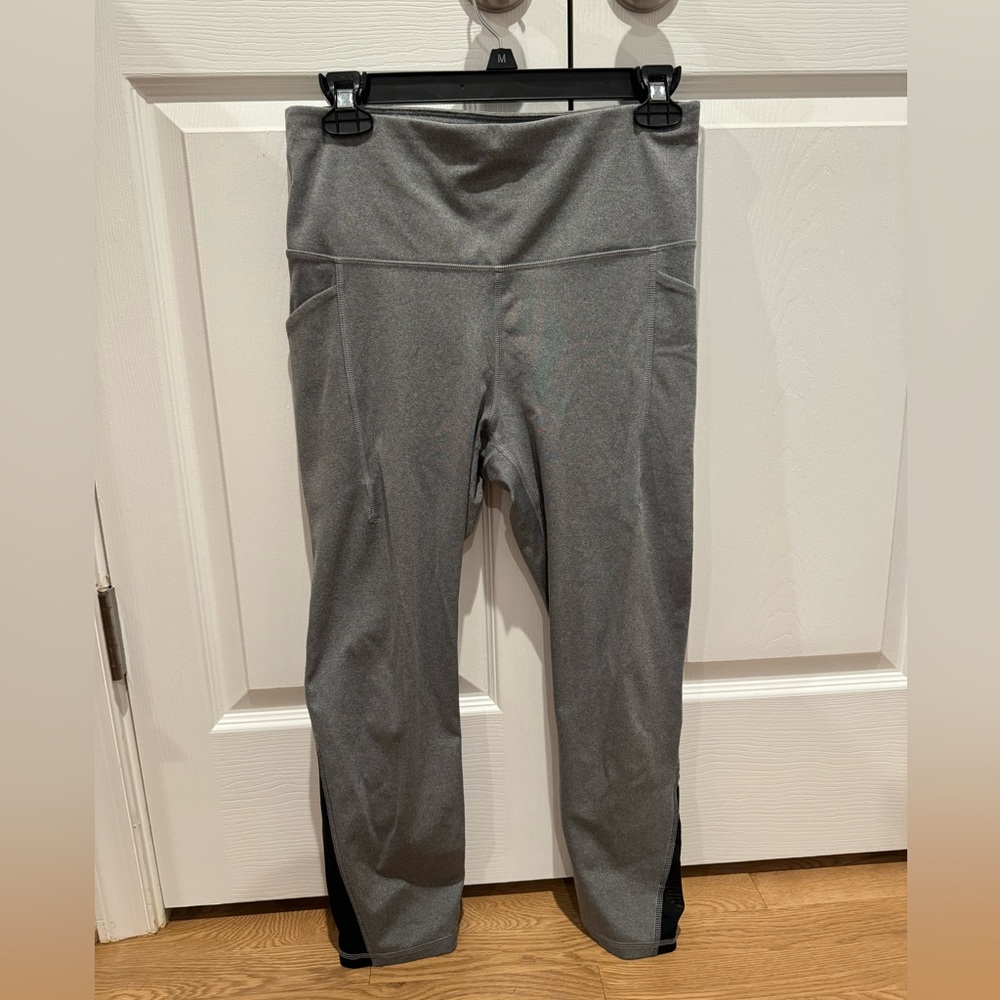 All in motion capri length leggings with mesh cutouts and pockets.